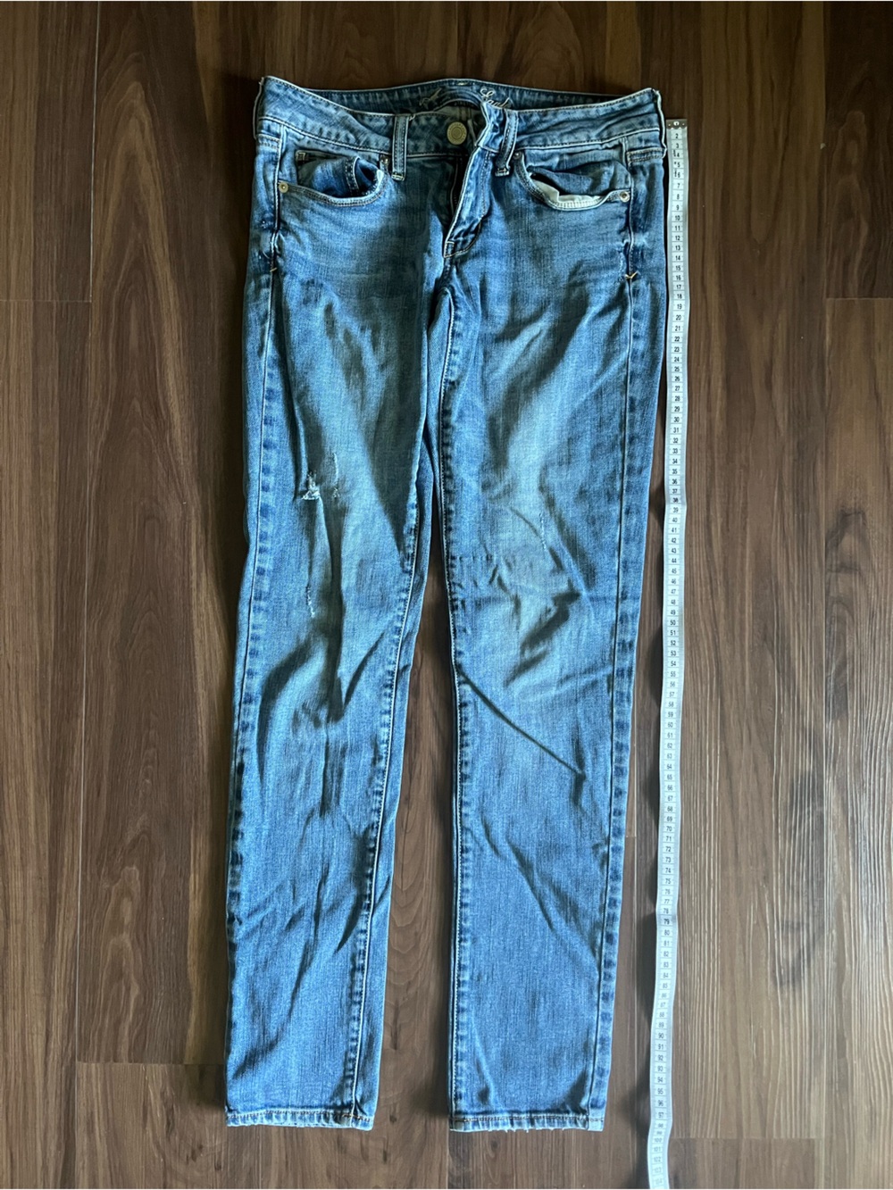 American Eagle Light Wash Distressed Low Rise Skinny Jeans